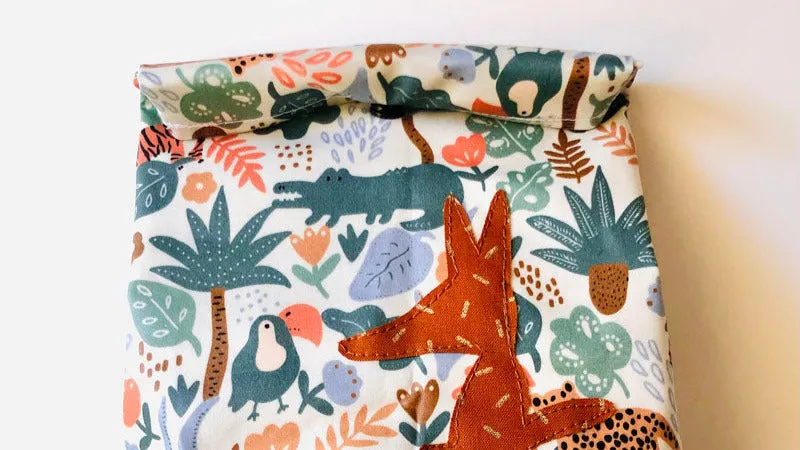 PIOLOU Le lunch-bag PM enduit animaux savane lunch bag goûter
