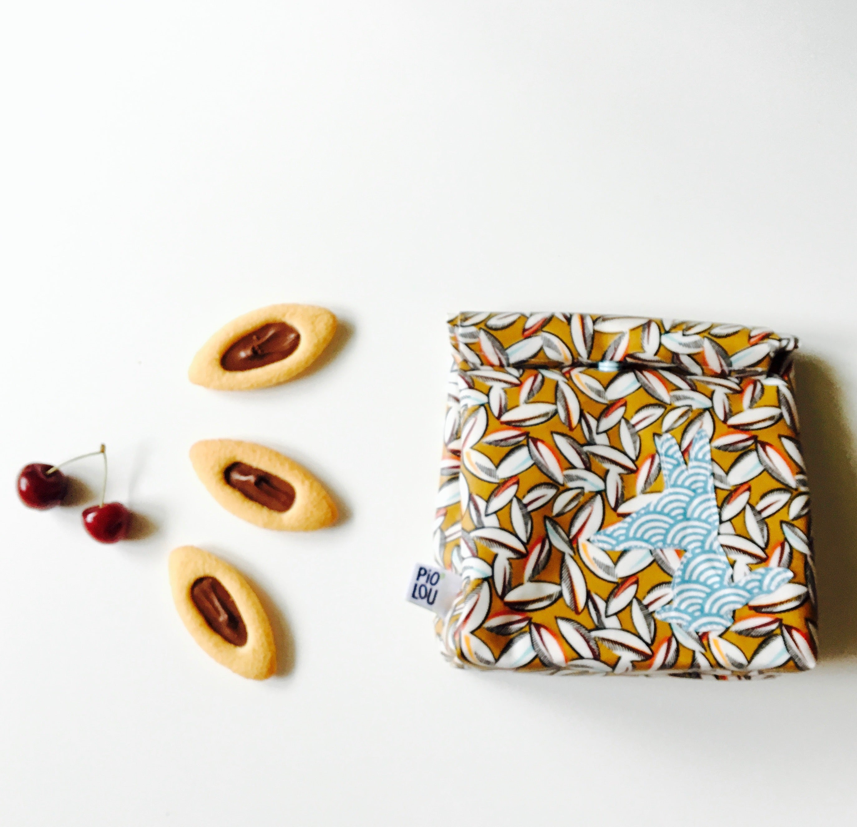 PIOLOU Le lunch-bag PM lunch bag tissu enduit marron cabosses