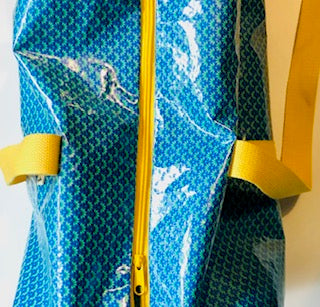 PIOLOU Le Sac Sac polochon bleu et jaune imperméable
