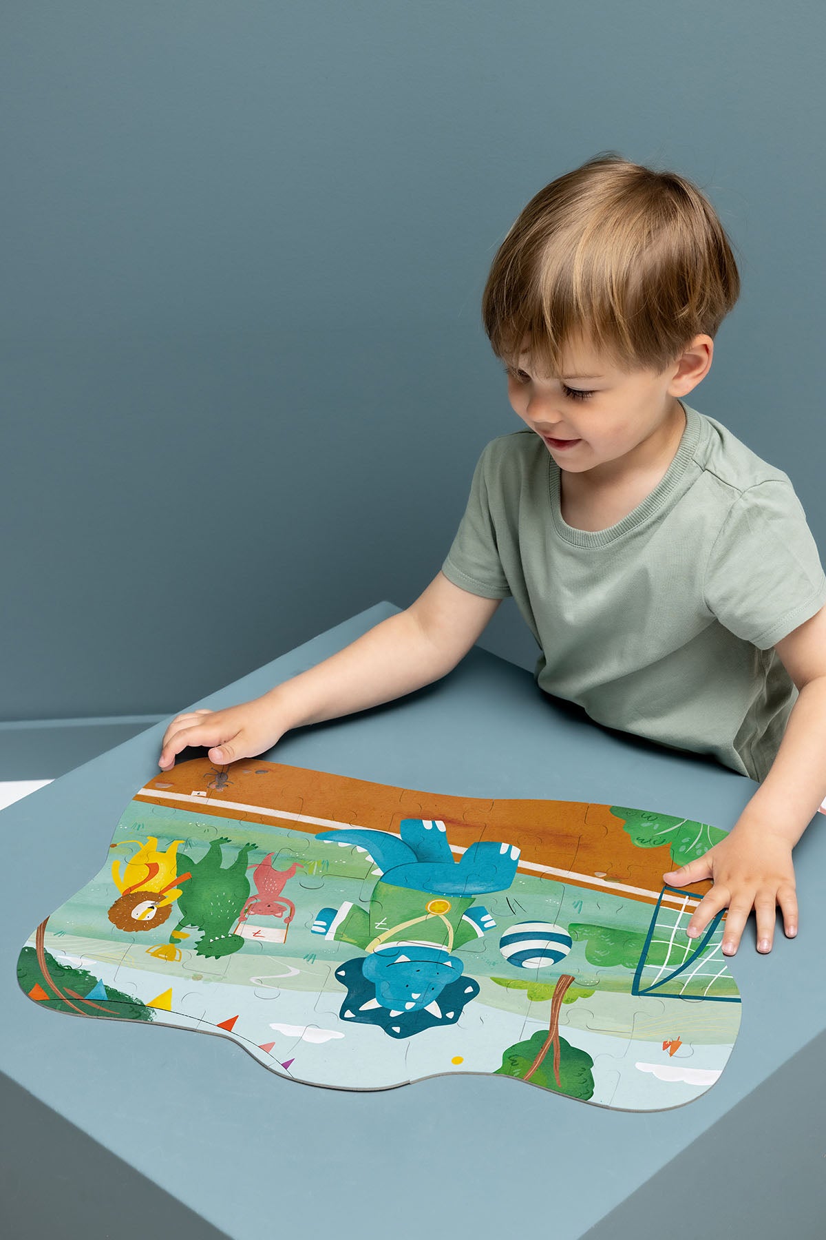 Trixie Baby Jeux, puzzles & livres Footballeur Mr. Triceratops puzzle à forme 35 pièces