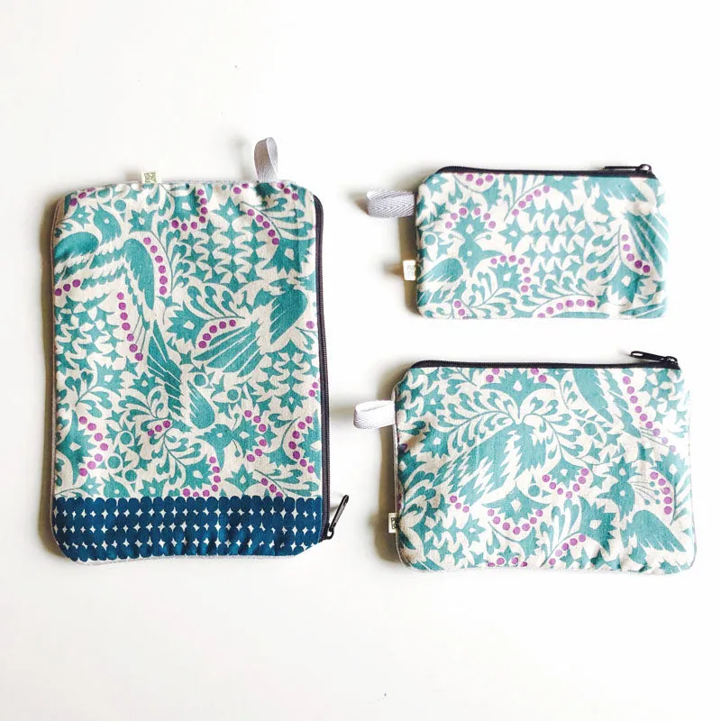 PIOLOU La Pochette pochette fleurie oiseau bleu turquoise PM