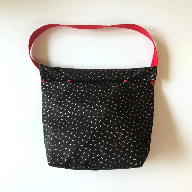 PIOLOU Le Lunch-Bag GM lunch bag noir motifs dorés enduit