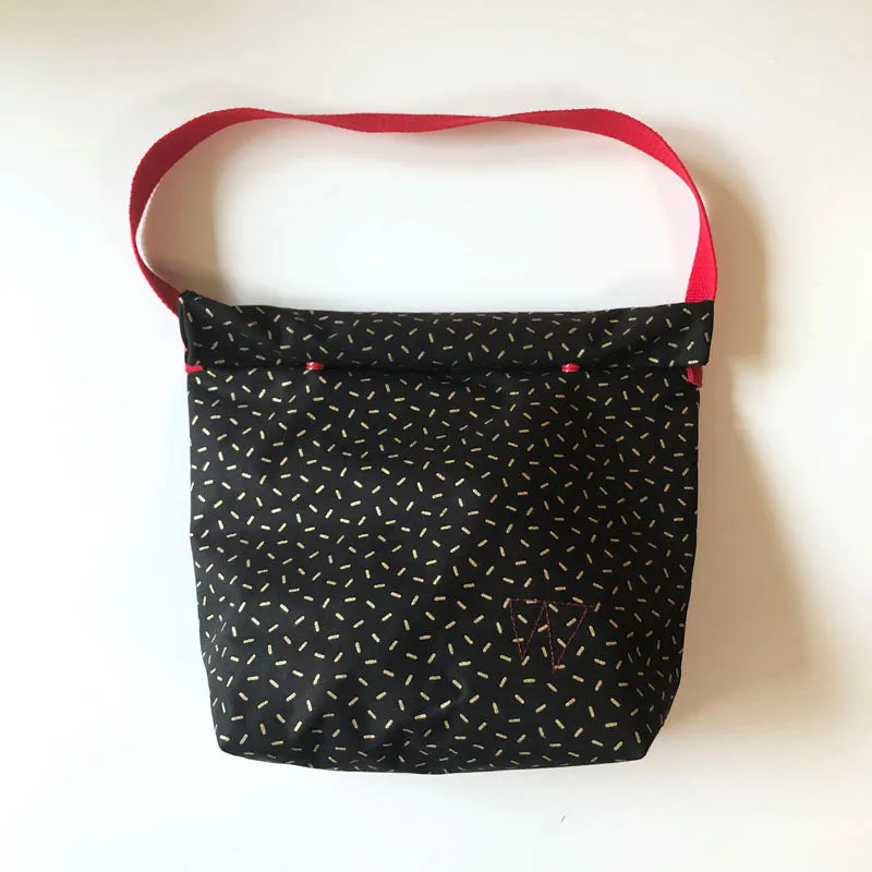 PIOLOU Le Lunch-Bag GM lunch bag noir motifs dorés enduit