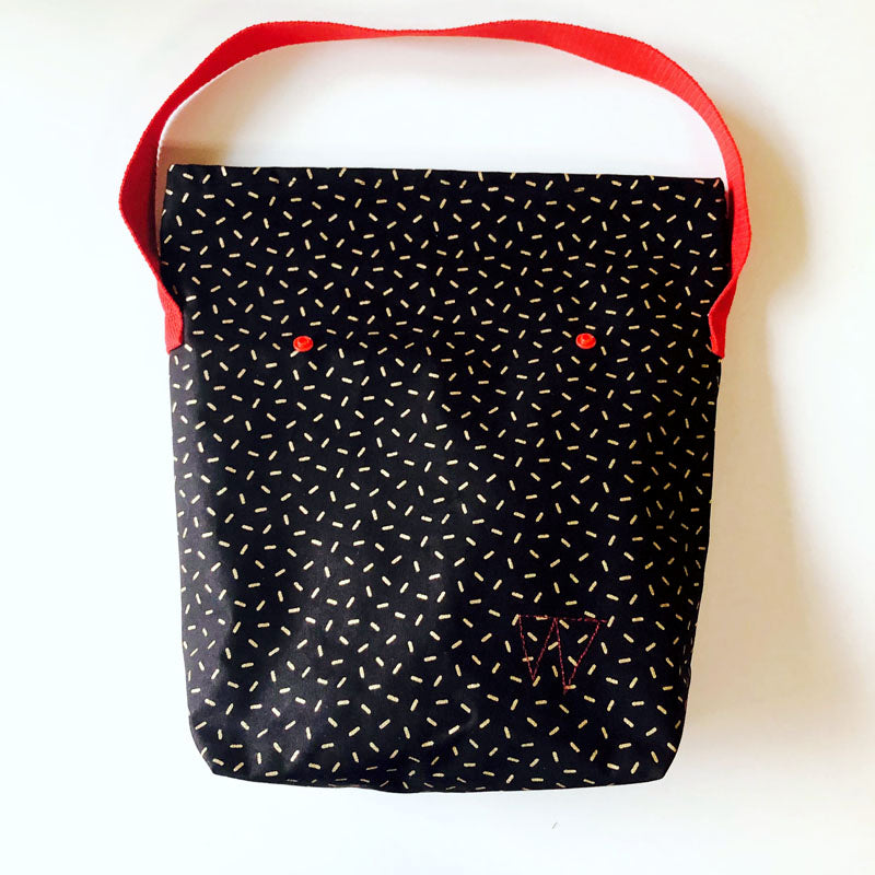 PIOLOU Le Lunch-Bag GM lunch bag noir motifs dorés enduit