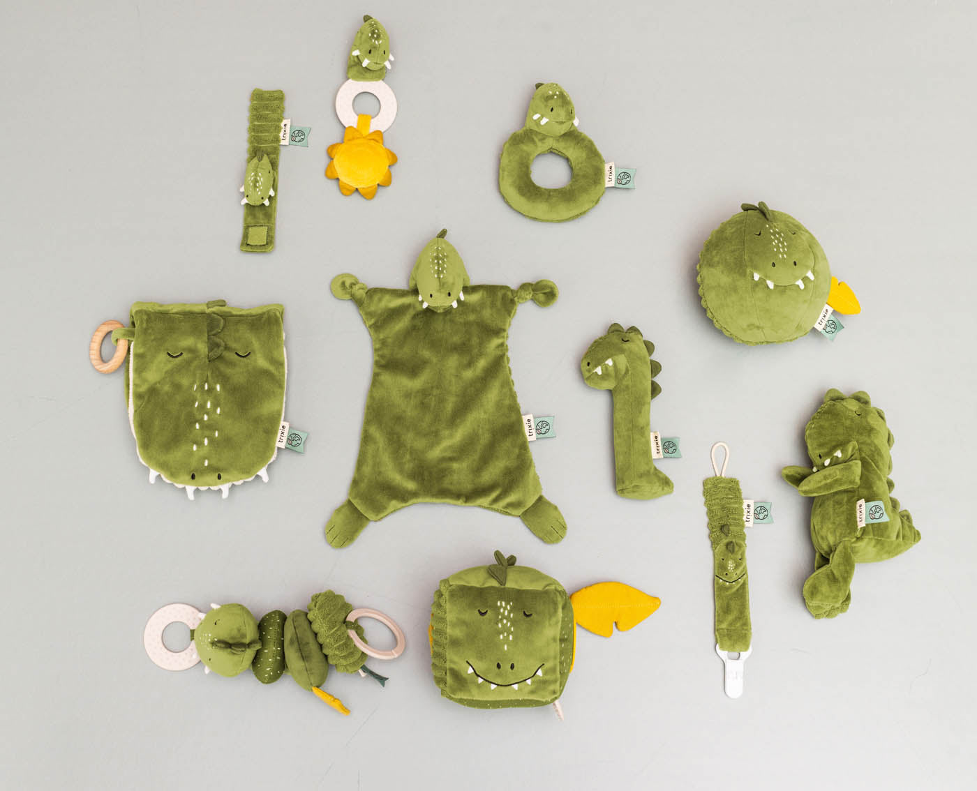 Trixie Baby Premiers jouets Doudou Mr. Dino avec attache tétine