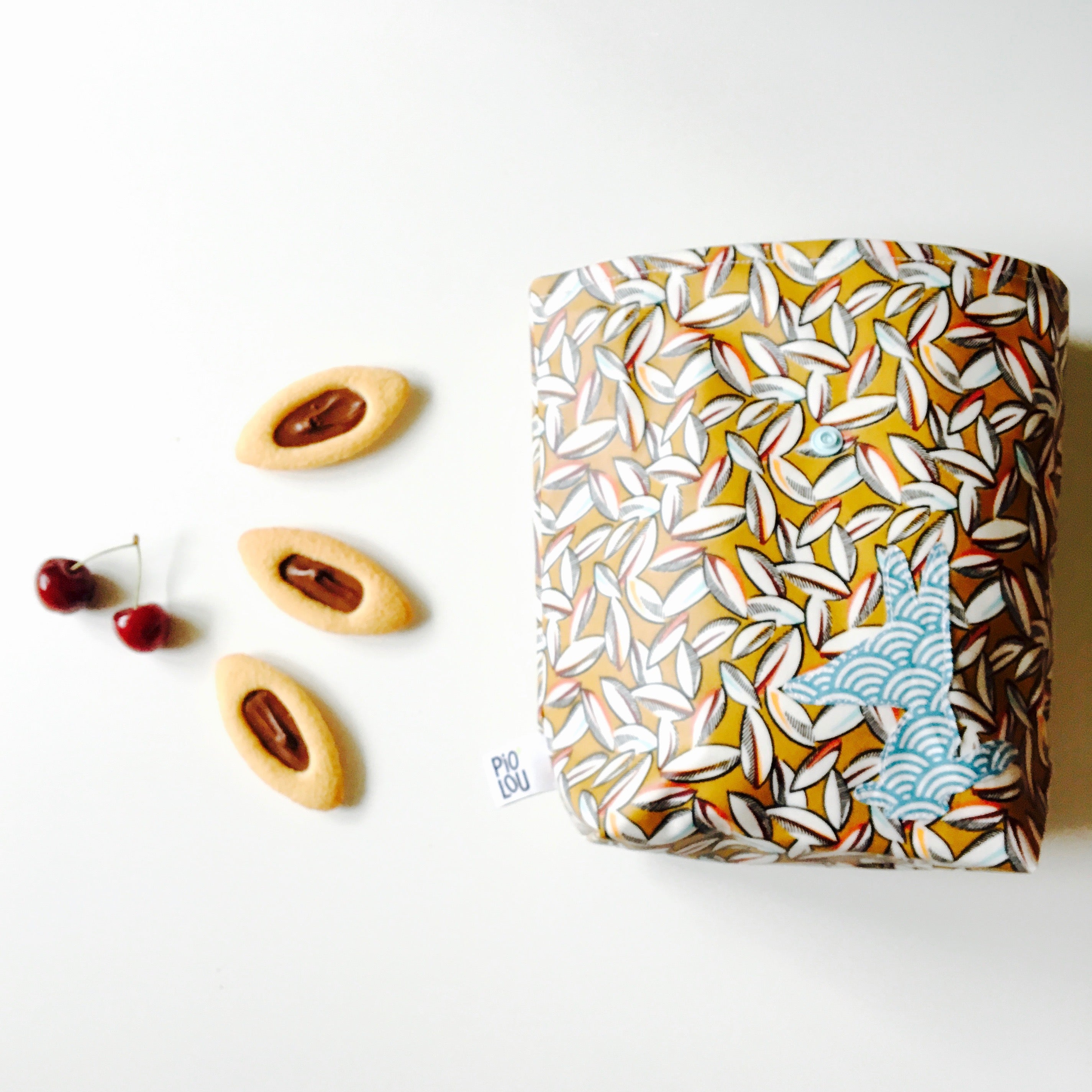 PIOLOU Le lunch-bag PM lunch bag tissu enduit marron cabosses