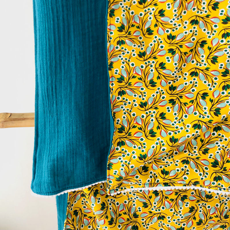PIOLOU Le foulard réversible gaze de coton bleu canard et viscose jaune fleurie