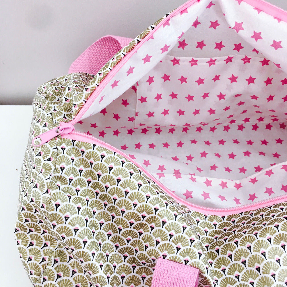 PIOLOU Le Sac Sac polochon rose doré imperméable