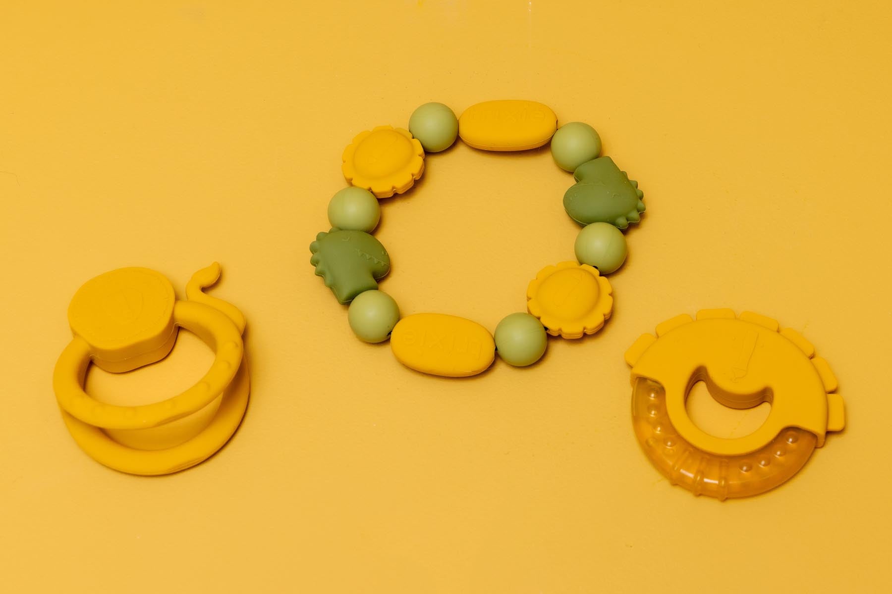 Trixie Baby Premiers jouets Bracelet de dentition en silicone Mr. Dino & Mr. Lion