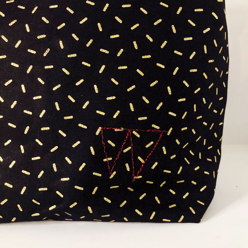 PIOLOU Le Lunch-Bag GM lunch bag noir motifs dorés enduit